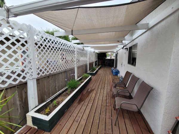 North County Cottage 11 - side patio.JPG