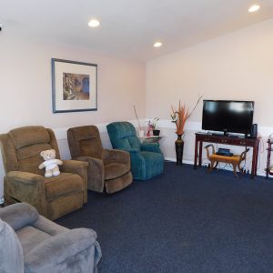 Serra Mesa Guests Home III LLC 3 - living room.JPG