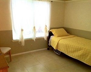 Alychris Senior Board and Care 6 - private room.jpg