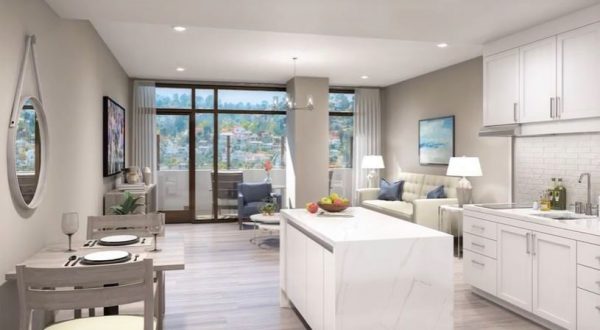 Belmont Village La Jolla 5 - Apartment living room and kitchen.JPG