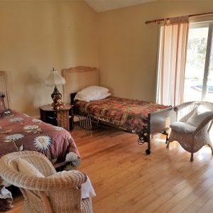 Family Care - El Mar Home 6 - shared room.jpg