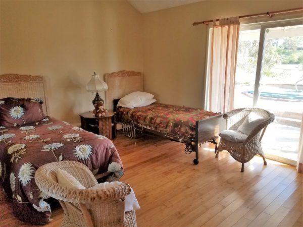 Family Care - El Mar Home 6 - shared room.jpg