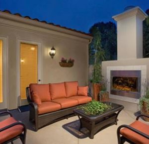 Newport Senior Living I 4 - patio fireplace.JPG