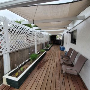 North County Cottage 11 - side patio.JPG