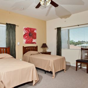 Plaza Village Senior Living 6 - master shared suite.jpg