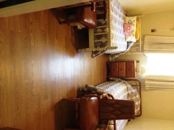 Saint Francis Home shared room.jpg