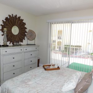 grossmont-gardens-senior-living-one-bedroom-apartment-bedroom-2.jpg